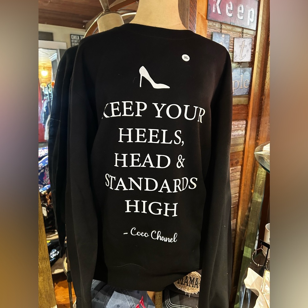 Black sweatshirt with CoCo quote